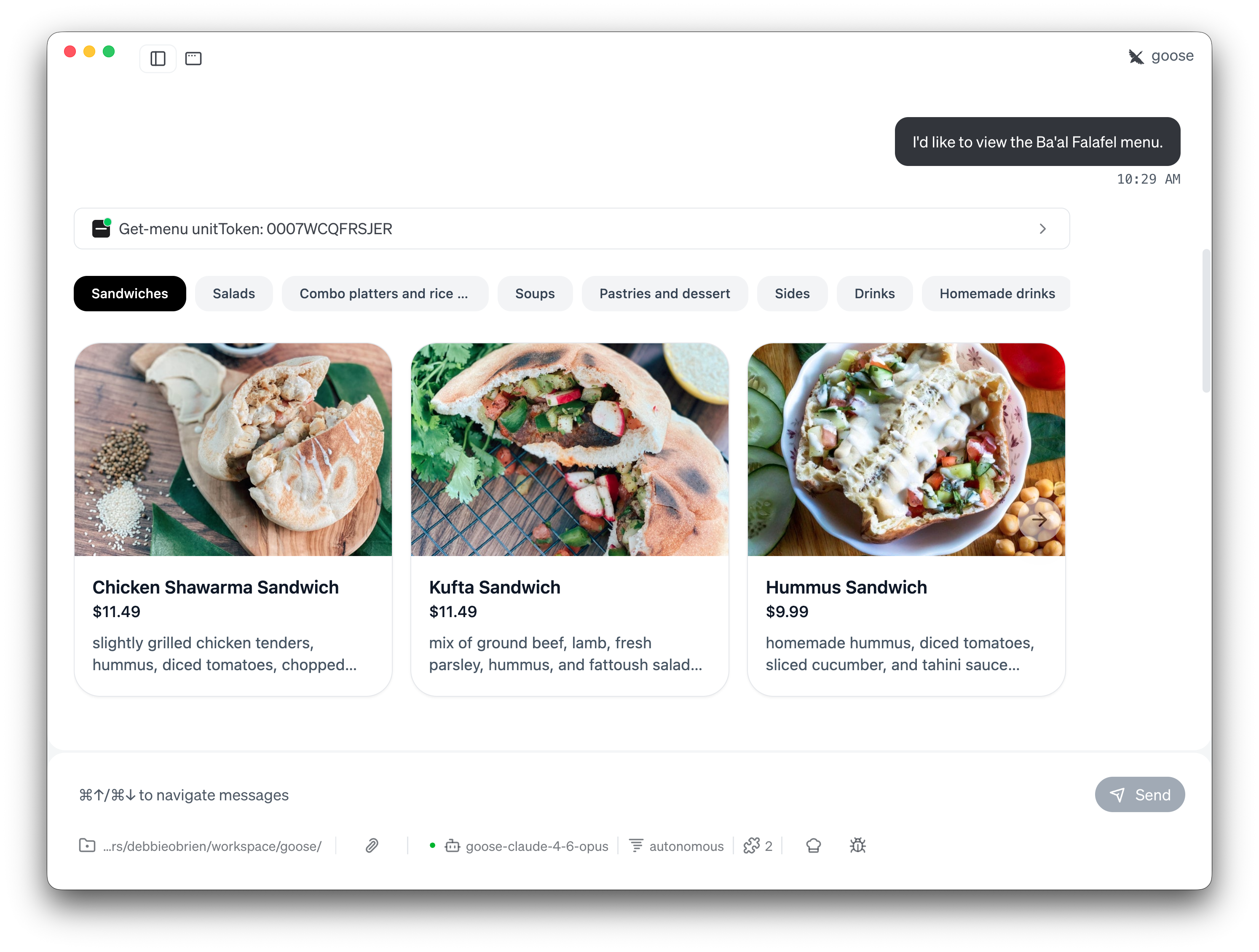 Ba'al Falafel menu displayed with category tabs, photos, prices, and descriptions in goose